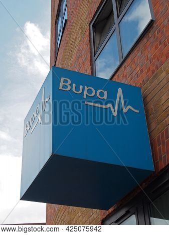 Leeds, West Yorkshire, United Kingdom - 17 June 2021: Sign And Logo Above A Bupa Healthcare Building