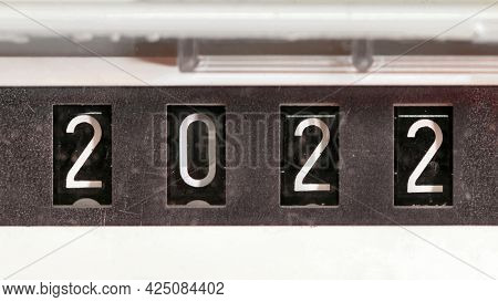 New year 2022 concept, mechanical counter turning from number 2021 to 2022