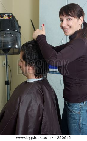 Hairdresser Make Clips To The Men