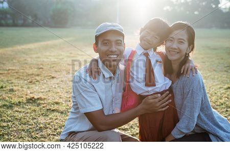 Family Asian With Their Primary School Student Kid
