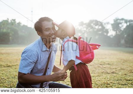 Daughter Kiss Her Father Cheek On First Day Primary School