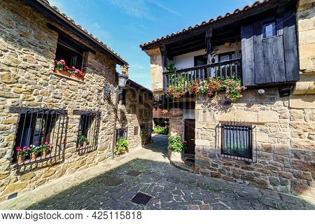 Old Mountain Village With Stone Houses And Cobbled Alleys. Barcena Mayor Santander.