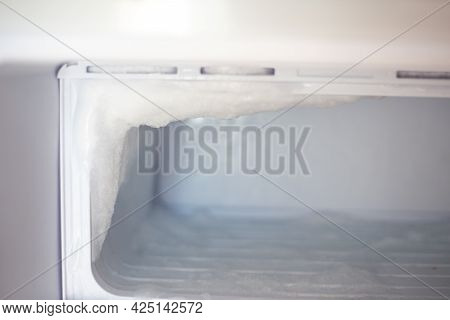 Freezer With Ice Freezing. Defrosting And Caring For The Refrigerator.