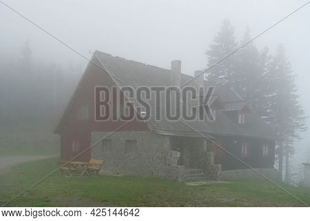  Cozia Chalet in Cozia Mountains, Carpathians, Romania, Europe - rainy and foggy weather                              