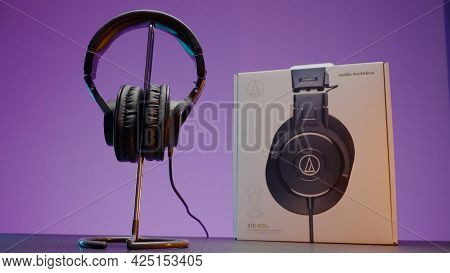 Russia, Moscow - May 5, 2021: New Headphones From Audio Company. Action. Stylish Headphones With Hig
