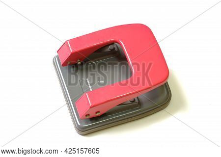 Red Paper Hole Puncher Isolated On White Background
