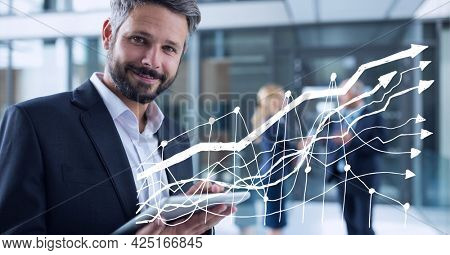 Animation of financial data processing over businessman using tablet. global business, digital interface, technology and networking concept digitally generated video.
