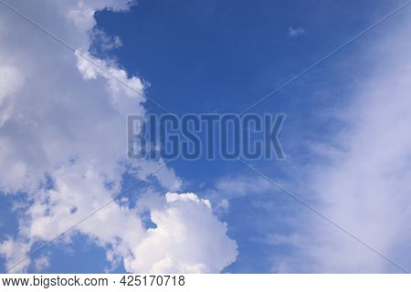 White Cumulus Clouds On Blue Sky Background, Bright Optimistic Positive Background
