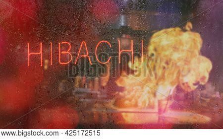 Hibachi And Sushi Neon Sign With Chef In Background, Blur Rainy Window Image