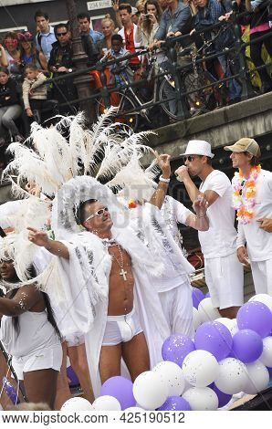 Amsterdam, Holland - August 04, 2012: People Celebrate The Gay Parade, Celebration On The Canals Of 
