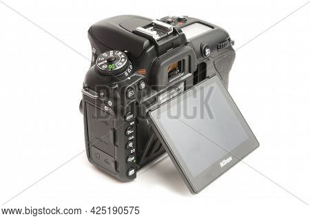 Carrara, Italy - June 26, 2021 - Rear View Of A D7500 Nikon Dslr Camera Body With Tilted Lcd Screen