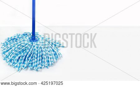 Rope mop in blue. Microfiber mop. House cleaning.      