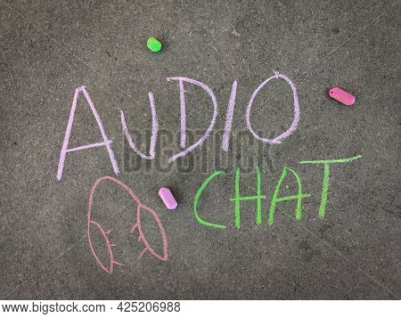 The Inscription Text On The Grey Board, Audio Chat With Hand Drawn Head Phone. Using Color Chalk Pie