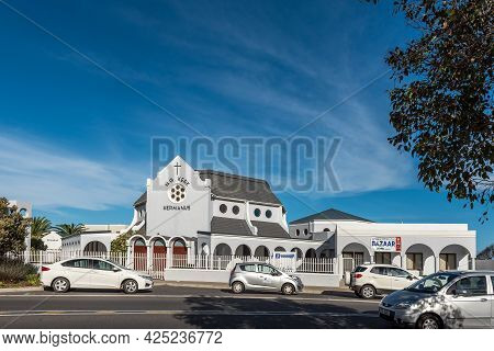 Hermanus, South Africa - April 12, 2021: A Street Scene, With The Dutch Reformed Church, In Hermanus