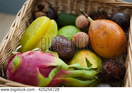 Big Basket Of Fresh Tropical Fruits, Passion Fruit, Carambola, Dragon Fruit Or Pitaya, Mangosteen, L