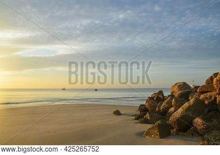 Colourful Glowing Pastel Cirrostratus Cloudy Tropical Beach Sunrise Seascape. Waterfront At Dawn Fea