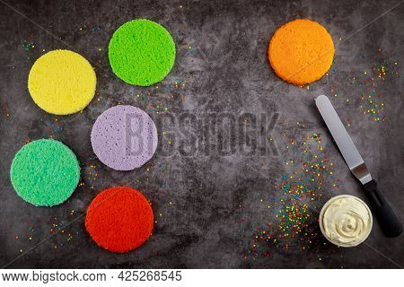Rainbaw Cake, Frosting And Spatula For Making Birthday Cake.