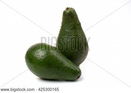 Two Avocadoes Whole Fruit Isolated On A White Background