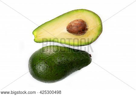 Avocado Whole Fruit And Slices, Isolated On A White Background