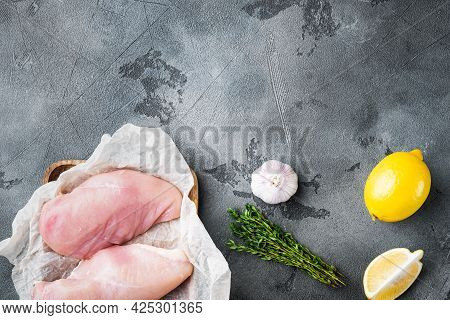 Crispy Garlicky Chicken Raw Ingredient  On Grey Background, Top View  With Copy Space