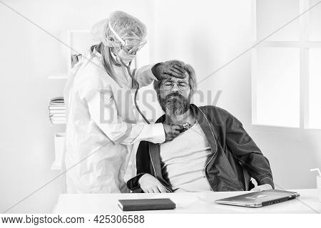 Coronavirus Symptoms. Diagnosis Of Pneumonia. Sars Concept. Doctor Protective Equipment Examines Mal