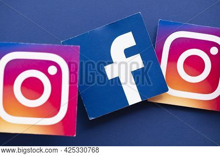 London, Uk - June 2021: Facebook And Instagrm Logos Printed Onto Paper