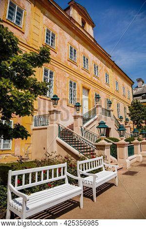 Krasny Dvur Chateau, North Bohemia, Czech Republic, 19 June 2021: Baroque Yellow Castle With Stairs,