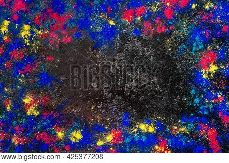 Top View Abstract Colorful Happy Holi Background. Color Vibrant Powder On Concrete. Colored Splash E