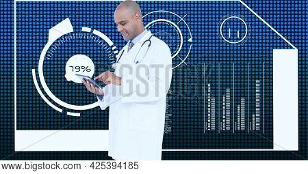 African american male doctor using digital tablet against medical data processing on blue background. medical research and science technology concept