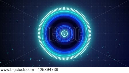Image of glowing blue scope scanning and spinning with glitch on grid background. digital interface connection and communication concept digitally generated image.