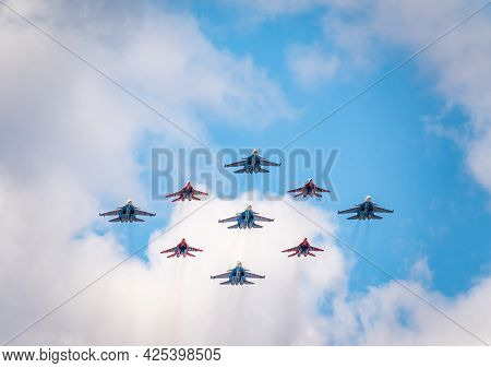 Moscow, Russia - May, 05, 2021: Diamond-shape Of 4 Mig-29 The Russian Knights And 5 Su-27 Swifts In 
