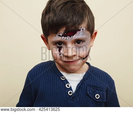 Little Cute Child With Facepaint On Birthday Party, Zombie Apocalypse Facepainting, Halloween Prepar