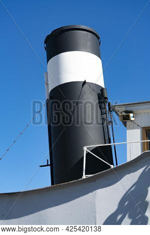 The Upper Deckhouse Of An Old Ship With Exhaust Pipe.