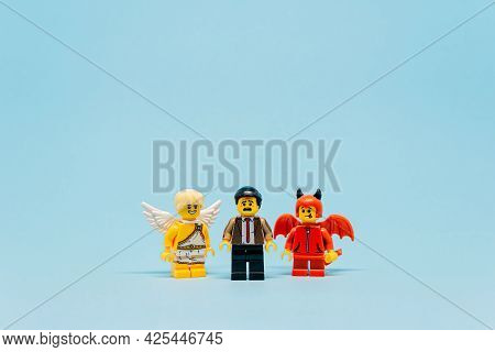 Between Devil And Angel. Illustrative Editorial. June 22, 2021