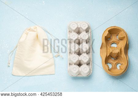 Eco Package For Eggs, Coffee And Cotton Bag On Blue Cement Background.zero Waste Cconcept. Package-f