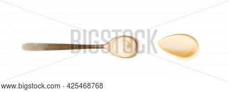 Mayonnaise Drop In The Spoon. Top View Of Sause Splash Isolated On White Background. High Reolution 