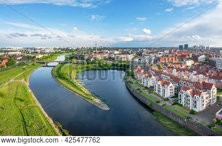 Poznan, Poland. Aerial View Of Warta River And Residential Buildings In The District Of Old Port