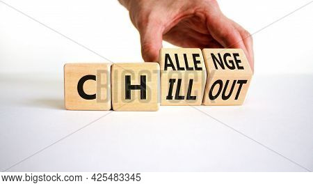Chillout Or Challenge Symbol. Businessman Turns The Wooden Cube And Changes The Word Chillout To Cha