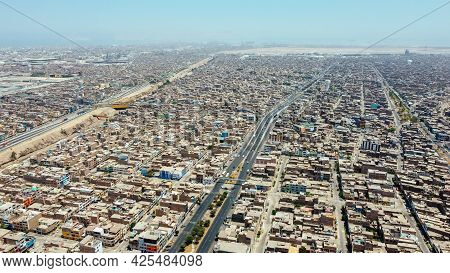 Aerial View Of The District Of San Martin De Porres And The Rimac River Located North Of The Capital