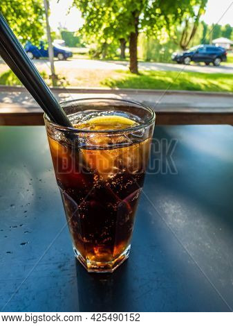 Glass Of Alcoholic Drink 'long Island Iced Tea' (vodka, Tequila, Light Rum, Triple Sec, Gin And Cola