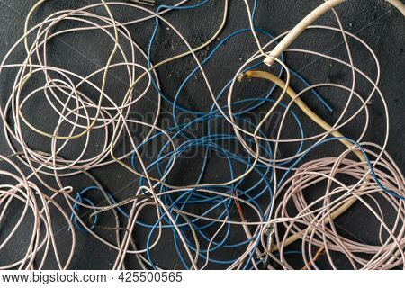Bunch Of Electronic Wires Or Caples In Colorful Isolation On The Table, Connection Concept