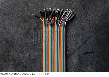 Bunch Of Electronic Wires Or Caples In Colorful Isolation On The Table, Connection Concept
