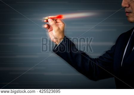 Businessman Throws Darts With Speed And Force To Hit The Target Accurately And Quickly. The Concept 