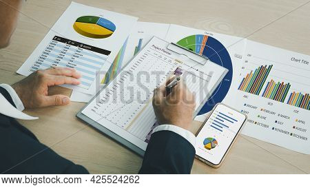 Preparing Report. Green And Red Graphs And Charts. Business Reports And Pile Of Documents On Ash Woo