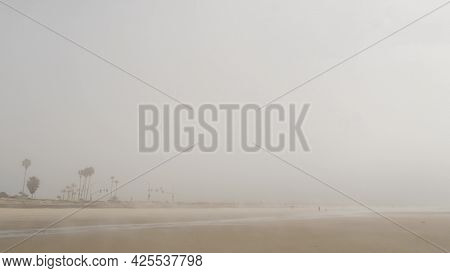 Sandy Misty Beach, Encinitas California Usa. Pacific Ocean Coast, Dense Fog Brume, Empty Sea Shore. 