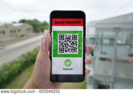Smartphone Outside With Digital Health Passport App For Travel Covid-19 Immune