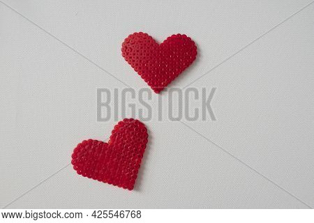 Thermo Mosaic Ready-made Figurines In The Form Hearts Red On White Background