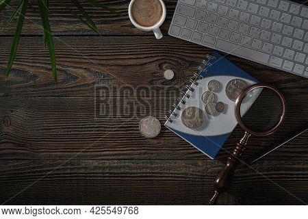 Numismatics. Old Collectible Coins Made Of Silver On A Wooden Table. Top View.