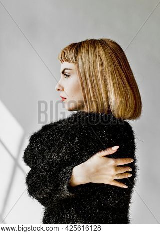 Short brown hair woman in a studio shoot
