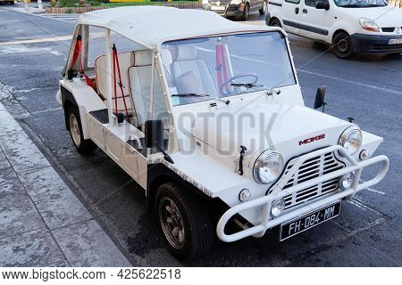 Sète , Ocitanie France  - 06 30 2021 : Mini Moke Car Beach By Austin Mini Utility Vehicle Side View 